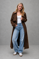 Women's long velvet trench coat in a luxurious soft velvet fabric with a longline silhouette, adjustable belted waist and elegant tailored fit, ideal for autumn and winter occasions.