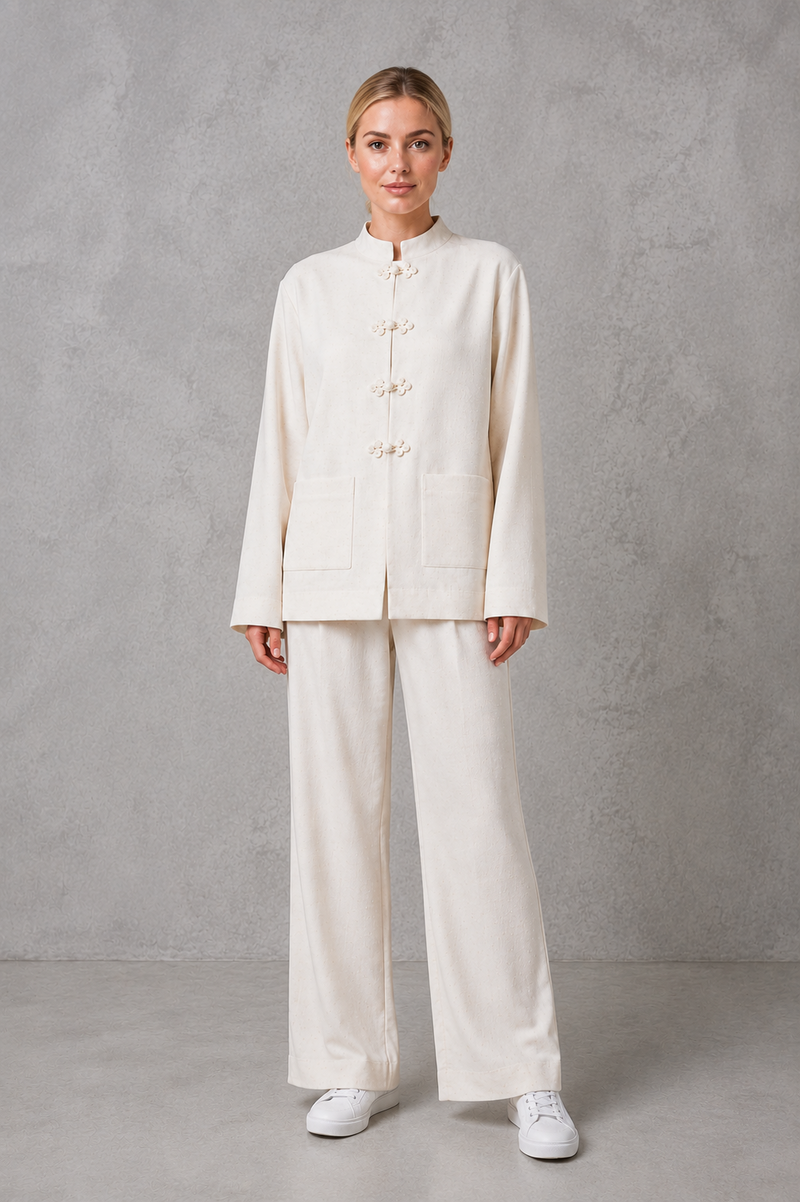 Women's white mandarin collar tailored jacket with a relaxed fit, clean front fastening and structured silhouette, ideal for smart casual, office and formal wear.