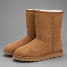 Women's mid-calf faux sheepskin winter boots with a soft cotton upper, corduroy shaft, plush lining, round toe and lightweight flat sole in a slip-on design for warm everyday winter comfort.