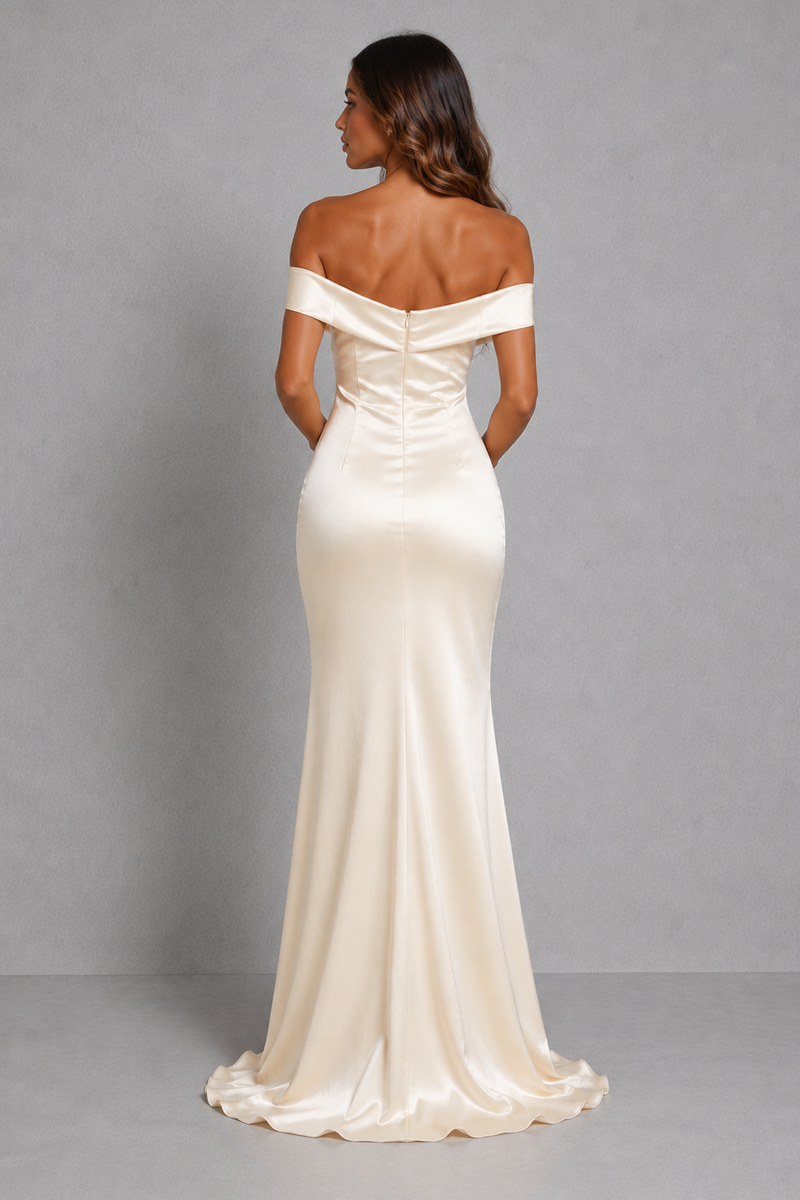 An off-the-shoulder ivory satin gown shown from the back on a model, featuring a structured corset-style waist and a slight train against a neutral gray studio background.