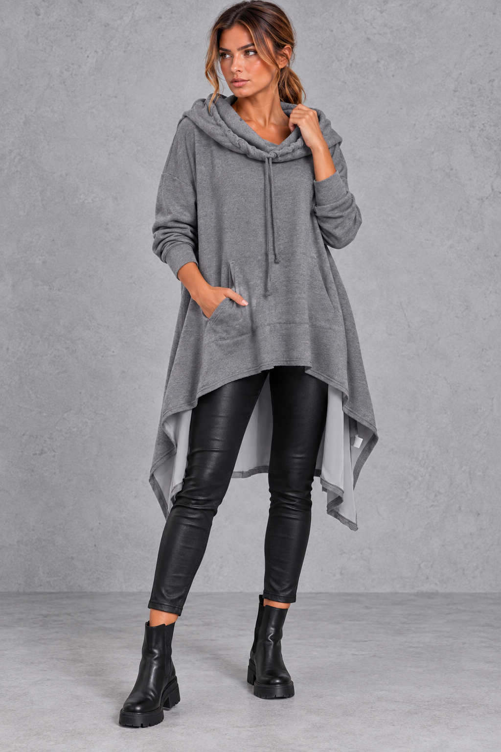 Women's dark grey oversized hoodie with asymmetric hanky hem – front view