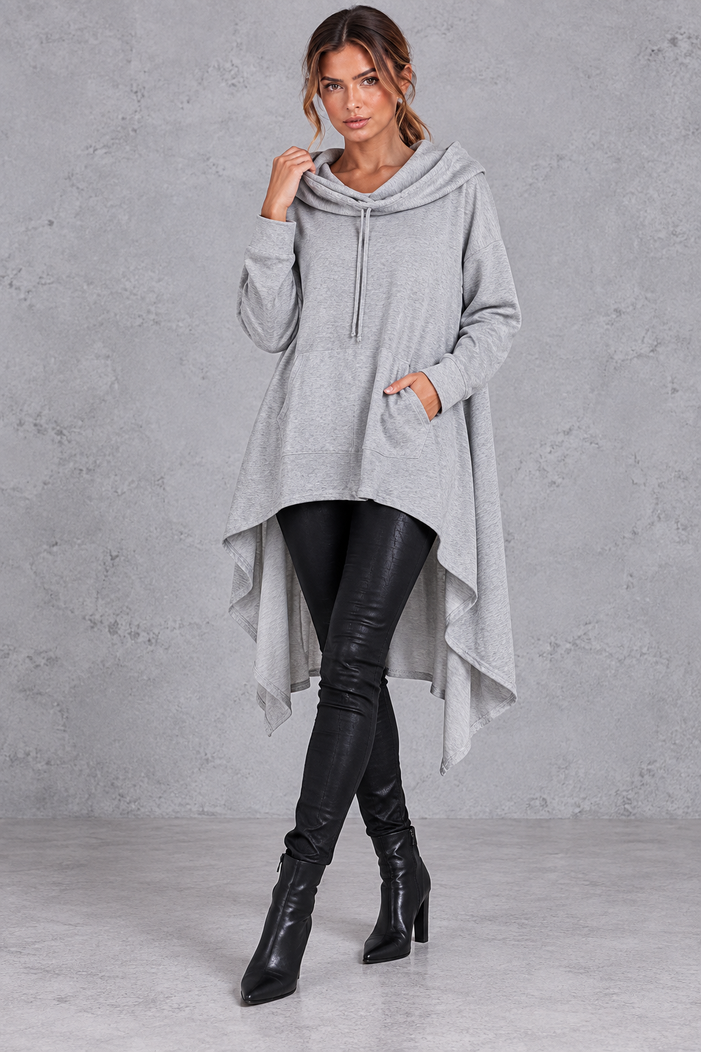 Women's light grey oversized hoodie with asymmetric hanky hem – front view