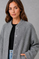 Women’s Alira oversized open-front jacket with a relaxed silhouette and soft, cosy finish, ideal for effortless smart-casual layering.