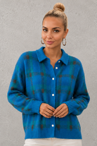 Women's plaid knit sweater with a classic check pattern, relaxed fit and soft knitted texture, offering lightweight warmth for casual everyday wear, layering and seasonal styling.