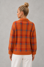 Women's plaid knit sweater with a classic check pattern, relaxed fit and soft knitted texture, offering lightweight warmth for casual everyday wear, layering and seasonal styling.
