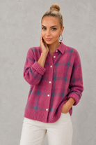 Women's plaid knit sweater with a classic check pattern, relaxed fit and soft knitted texture, offering lightweight warmth for casual everyday wear, layering and seasonal styling.