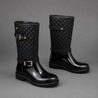 Women's quilted plaid mid-calf rain boots with a waterproof PVC upper, decorative side buckle, round toe and non-slip rubber sole, designed as comfortable slip-on Wellington boots for rainy days, gardening and outdoor wear.