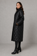 Women’s reversible quilted mid-length coat with a classic plain quilted side and bold leopard-print reverse, featuring lapels and side pockets.