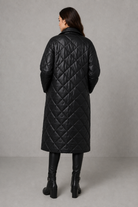 Women’s reversible quilted mid-length coat with a classic plain quilted side and bold leopard-print reverse, featuring lapels and side pockets.