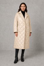Women’s reversible quilted mid-length coat with a classic plain quilted side and bold leopard-print reverse, featuring lapels and side pockets.