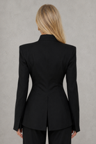 Women's sculpted cut-out blazer with a tailored fit, high neckline, structured shoulders, long sleeves and statement front cut-out, crafted from smooth premium fabric for elegant evening and occasion wear.