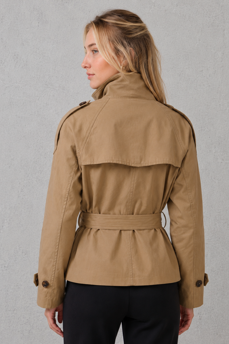 Women's short belted trench coat in a classic tailored design with an adjustable waist belt, lightweight fabric and a flattering fit, ideal for spring, autumn and everyday wear.