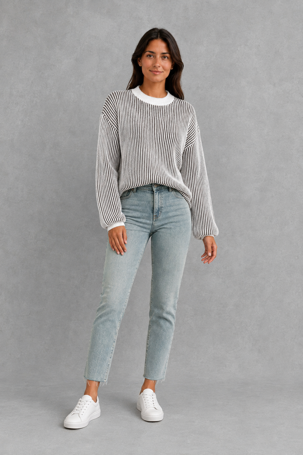 Women’s  striped knit jumper with a relaxed fit, drop shoulders, crew neckline and long sleeves.