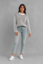 Women’s  striped knit jumper with a relaxed fit, drop shoulders, crew neckline and long sleeves.