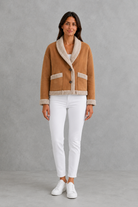 Women’s suede-look teddy coat with a relaxed fit, cosy texture, long sleeves and classic lapel collar.