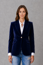 Women’s elegant velvet blazer jacket with classic lapel collar and tailored fit for autumn styling.