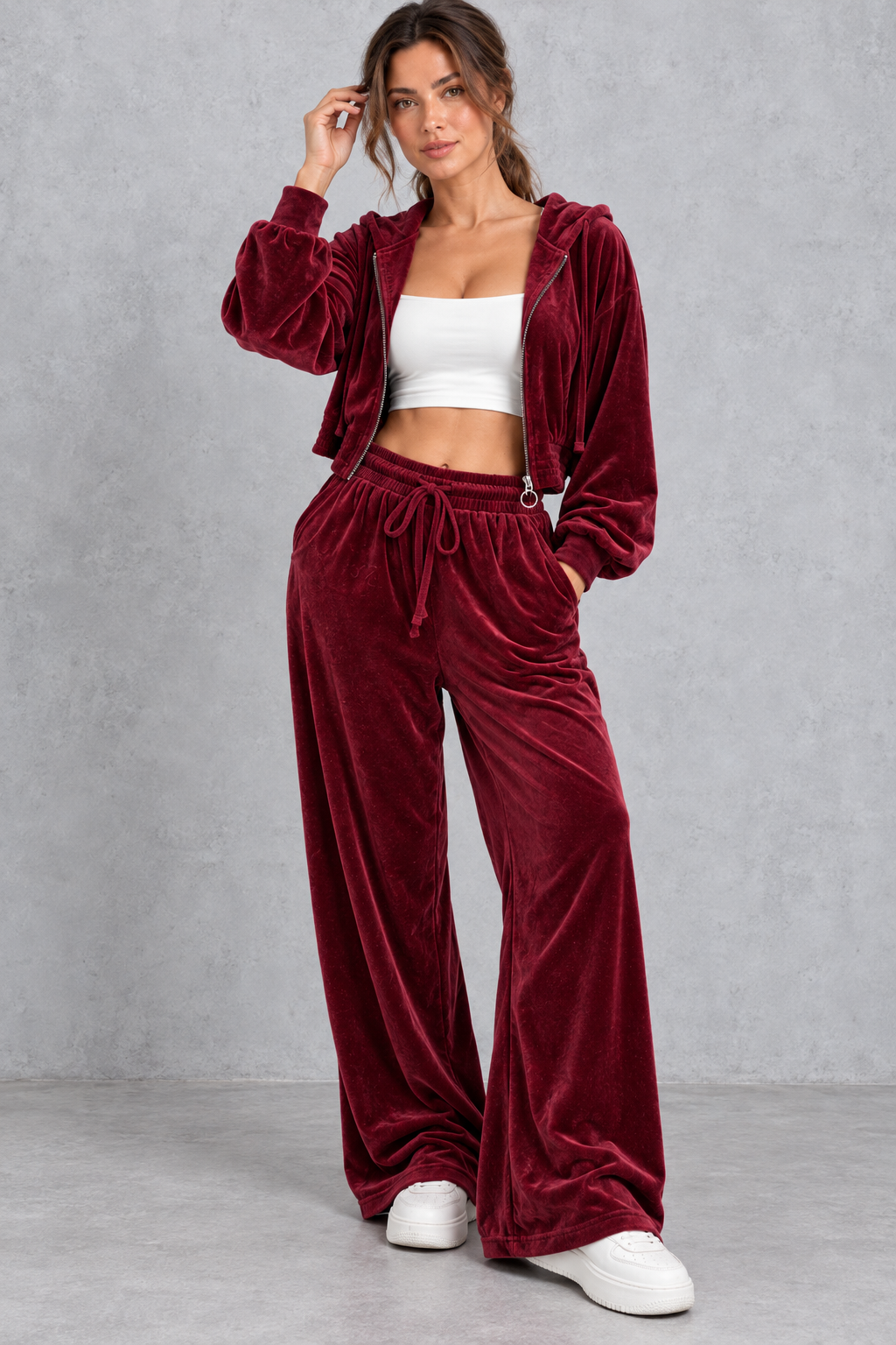 Women's burgundy velvet cropped hoodie and wide leg trouser set – front view