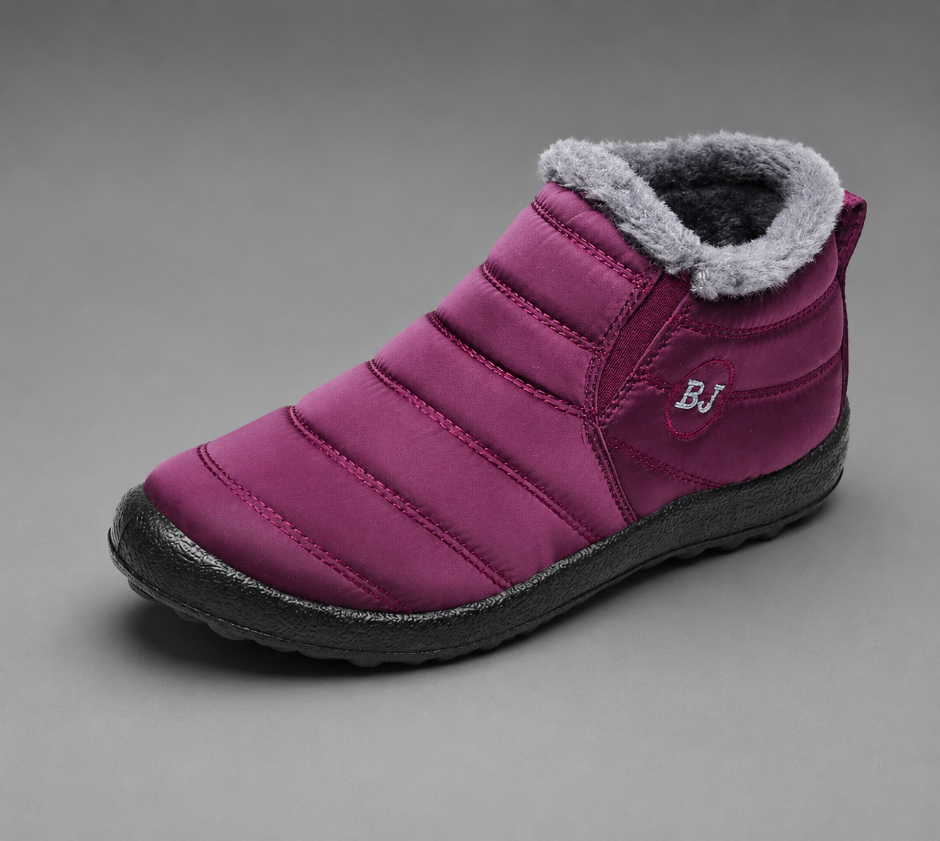 Women's waterproof faux fur-lined ankle snow boots with a quilted upper, lightweight slip-on design, round toe and durable non-slip sole, providing warm, comfortable and weather-resistant winter footwear for everyday outdoor wear.