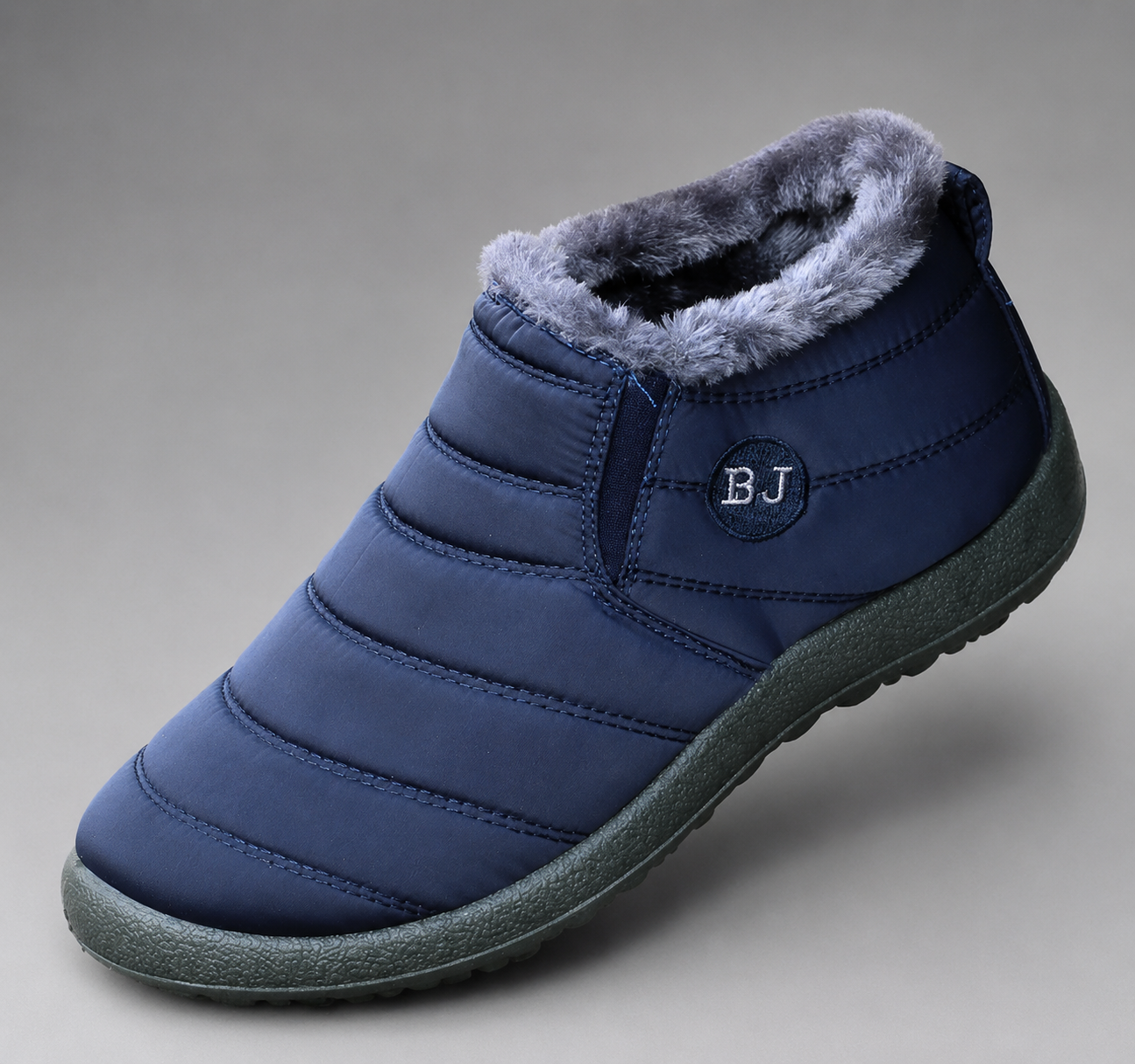 Women's waterproof faux fur-lined ankle snow boots with a quilted upper, lightweight slip-on design, round toe and durable non-slip sole, providing warm, comfortable and weather-resistant winter footwear for everyday outdoor wear.