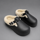 Women's waterproof fur-lined mule slippers with a thick non-slip sole, plush faux fur lining, metal buckle detail and lightweight slip-on design for warm indoor comfort during autumn and winter.