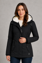 Women's waterproof hooded longline coat with a warm insulated lining, adjustable hood, and elegant longline design, offering reliable all-weather protection for everyday wear, commuting, travel, and outdoor walks.