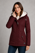 Women's waterproof hooded longline coat with a warm insulated lining, adjustable hood, and elegant longline design, offering reliable all-weather protection for everyday wear, commuting, travel, and outdoor walks.