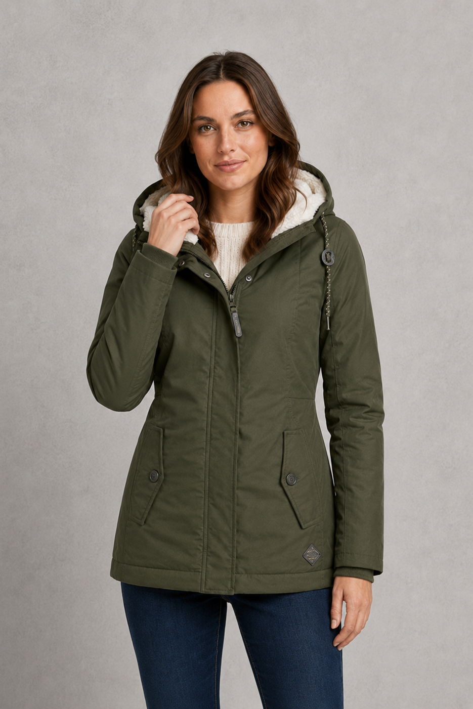 Women's waterproof hooded longline coat with a warm insulated lining, adjustable hood, and elegant longline design, offering reliable all-weather protection for everyday wear, commuting, travel, and outdoor walks.