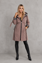 Women's waterproof hooded zip coat in a lightweight windproof design with full front zip fastening, tailored fit and weather-resistant fabric, ideal for everyday wear, commuting and rainy UK weather.