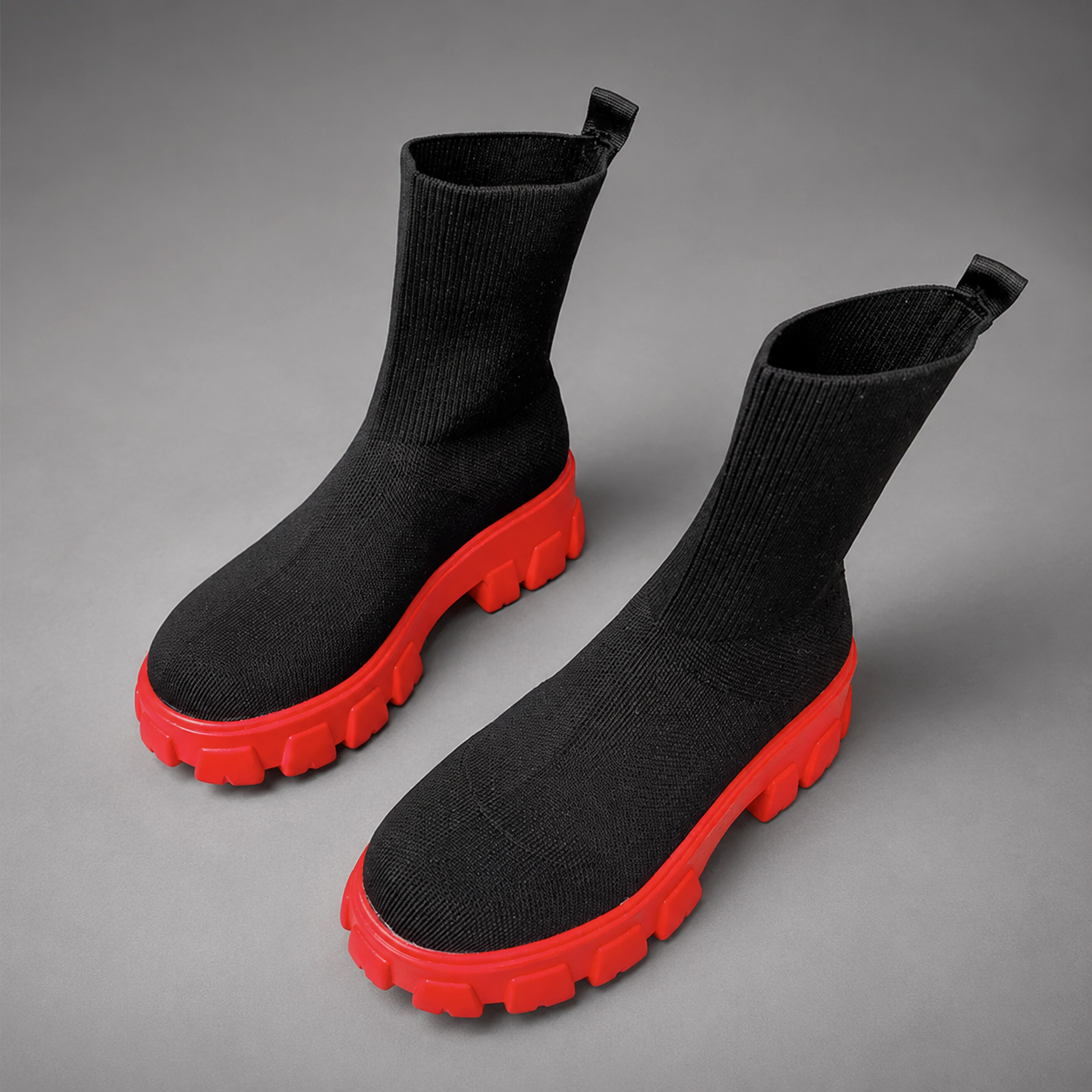 Women's waterproof stretch ankle boots with a flexible synthetic upper, warm faux fur lining, lace-up detailing, slip-on design and non-slip rubber sole for comfortable everyday autumn and winter wear.