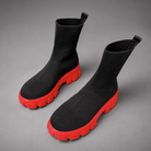 Women's waterproof stretch ankle boots with a flexible synthetic upper, warm faux fur lining, lace-up detailing, slip-on design and non-slip rubber sole for comfortable everyday autumn and winter wear.