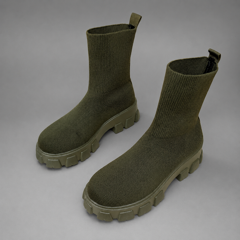 Women's waterproof stretch ankle boots with a flexible synthetic upper, warm faux fur lining, lace-up detailing, slip-on design and non-slip rubber sole for comfortable everyday autumn and winter wear.