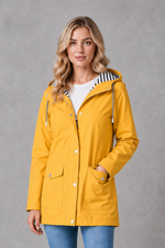 Women's waterproof and windproof hooded coat in a lightweight longline design with adjustable hood, weather-resistant fabric and a flattering regular fit, ideal for everyday wear, commuting and rainy British weather.