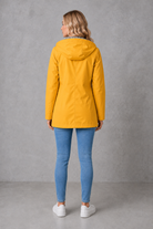Women's waterproof and windproof hooded coat in a lightweight longline design with adjustable hood, weather-resistant fabric and a flattering regular fit, ideal for everyday wear, commuting and rainy British weather.