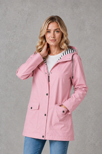 Women's waterproof and windproof hooded coat in a lightweight longline design with adjustable hood, weather-resistant fabric and a flattering regular fit, ideal for everyday wear, commuting and rainy British weather.