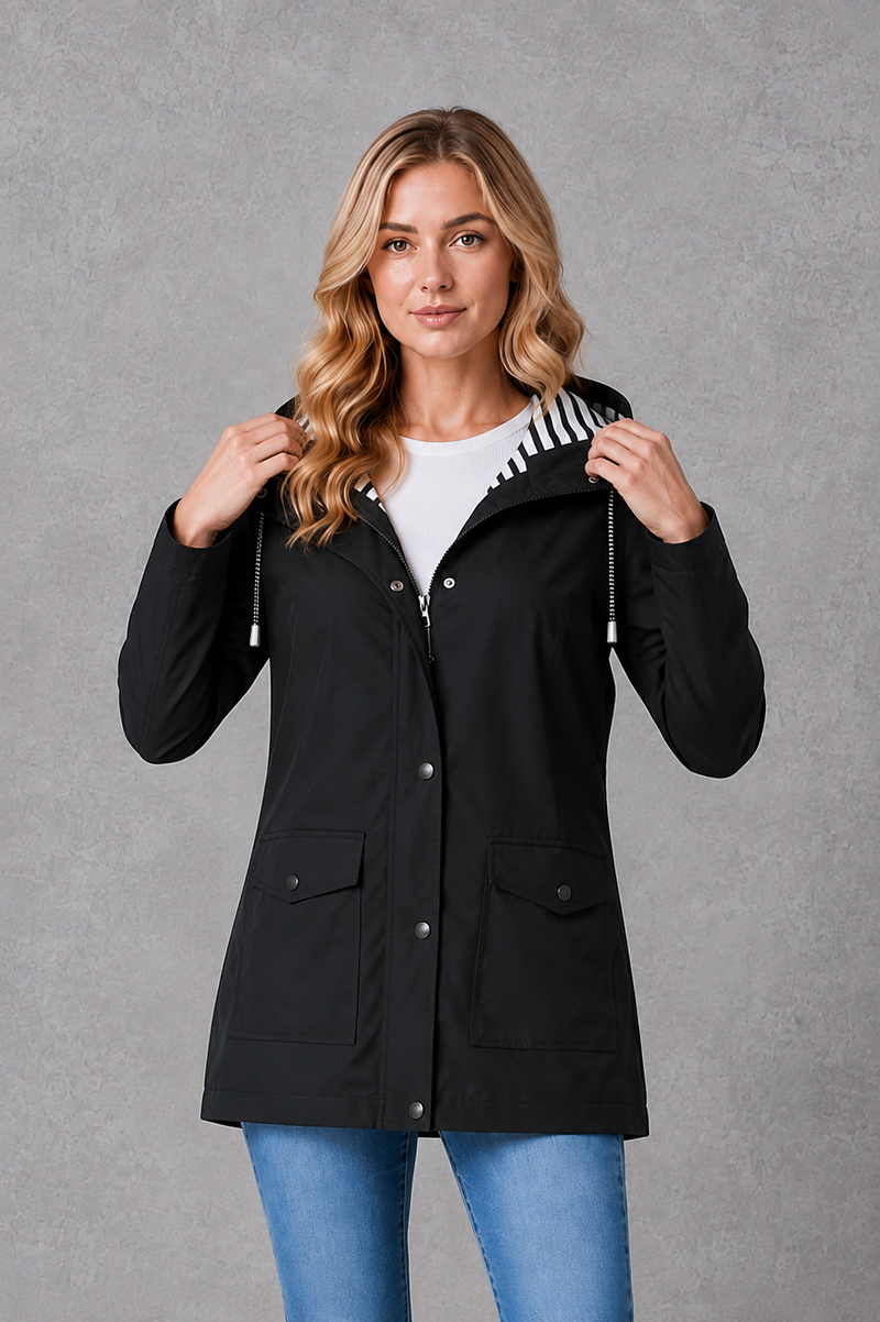 Women's waterproof and windproof hooded coat in a lightweight longline design with adjustable hood, weather-resistant fabric and a flattering regular fit, ideal for everyday wear, commuting and rainy British weather.