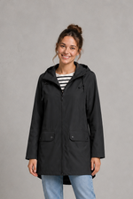 Women's waterproof and windproof hooded coat in a lightweight regular fit, featuring an adjustable hood and flattering silhouette. Ideal for autumn and winter, this weather-resistant rain jacket offers reliable protection for commuting, countryside walks and everyday wear.