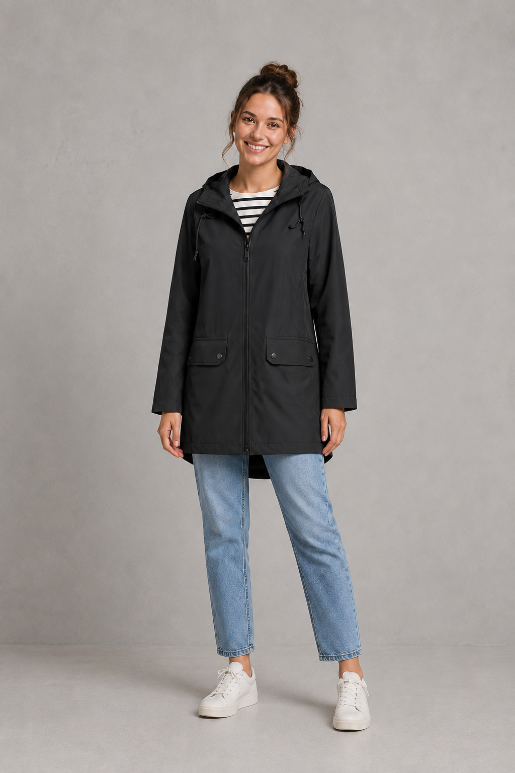 Women's waterproof and windproof hooded coat in a lightweight regular fit, featuring an adjustable hood and flattering silhouette. Ideal for autumn and winter, this weather-resistant rain jacket offers reliable protection for commuting, countryside walks and everyday wear.