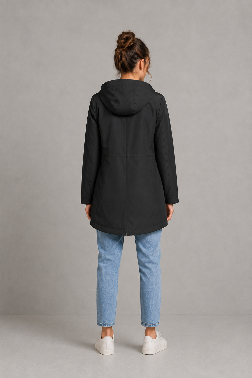 Women's waterproof and windproof hooded coat in a lightweight regular fit, featuring an adjustable hood and flattering silhouette. Ideal for autumn and winter, this weather-resistant rain jacket offers reliable protection for commuting, countryside walks and everyday wear.