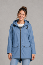 Women's waterproof and windproof hooded coat in a lightweight regular fit, featuring an adjustable hood and flattering silhouette. Ideal for autumn and winter, this weather-resistant rain jacket offers reliable protection for commuting, countryside walks and everyday wear.