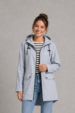 Women's waterproof and windproof hooded coat in a lightweight regular fit, featuring an adjustable hood and flattering silhouette. Ideal for autumn and winter, this weather-resistant rain jacket offers reliable protection for commuting, countryside walks and everyday wear.