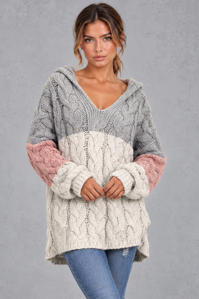 Women's grey multicolour chunky cable knit hooded jumper in grey, ivory and pink colour block – front view