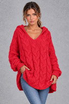 Women's red chunky cable knit hooded jumper with V-neck – front view