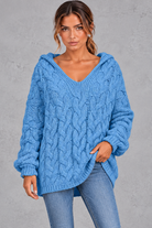 Women's mid blue chunky cable knit hooded jumper with V-neck – front view