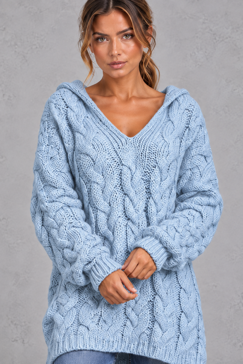 Women's light blue chunky cable knit hooded jumper – close-up of cable knit texture and V-neck hood