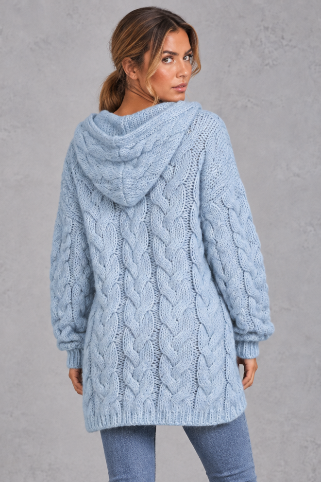 Women's light blue chunky cable knit hooded jumper – back view showing hood