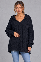 Women's black chunky cable knit hooded jumper with V-neck – front view