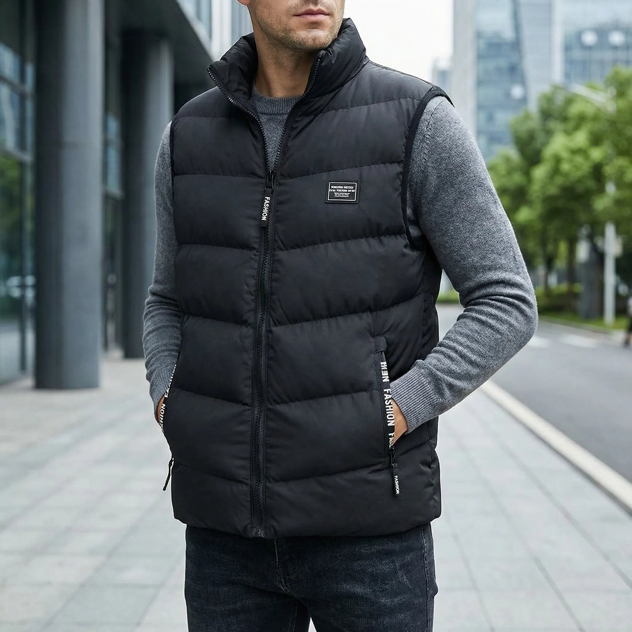 Man wearing a black puffer vest with a cityscape background