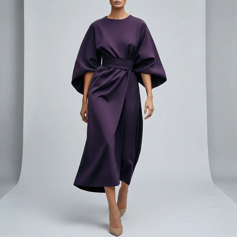 Purple dress with wide sleeves on a plain background1