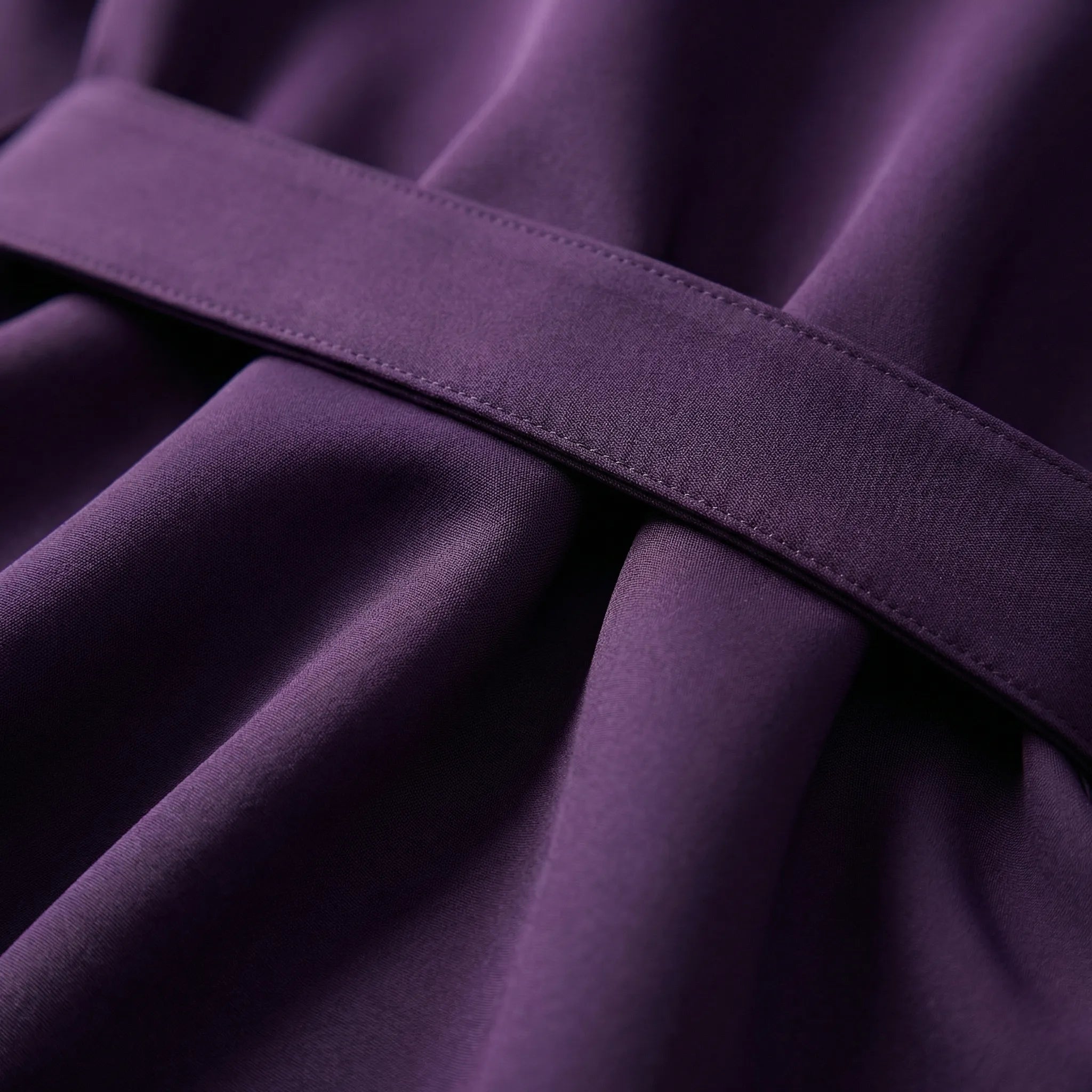 Close-up of a purple fabric with a belt2