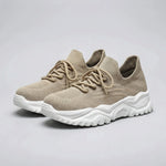 Beige sneakers with white soles on a gray background3
